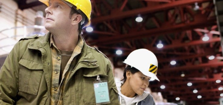 People wearing hard hat in factory